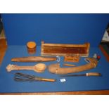 A quantity of kitchenalia including a rolling pin, a hand whisk, novelty bottle stoppers,