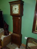 An Oak and Mahogany cased longcase / grandfather clock having light and dark-wood stringing,