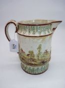 An 18th century hand painted jug with raised/relief hunting scene decoration,