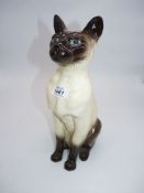 A Beswick fireside Siamese cat figure, 13 3/4" tall.