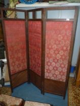 An Oak framed three-fold modesty screen the inset fabric panels having lattice patterned light/dark