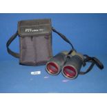 A pair of Tasco Futura binoculars, 12 x 50 mm, fully coated 272 ft = 1000 yds., cased.