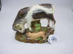 A circa 1830 Staffordshire pearl ware 'Bull Baiting' group depicting small brown dog taunting brown