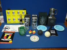 A small quantity of Guiness promotional material including glasses and other drinking related