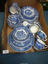 A quantity of blue and white china dinnerware including Wedgwood 'Avon Cottage' and Broadhurst