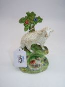 A Staffordshire pearl ware pottery bocage figure of ewe and lamb,
