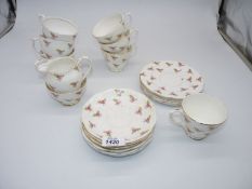 A quantity of Roslyn tea ware decorated with pink roses.