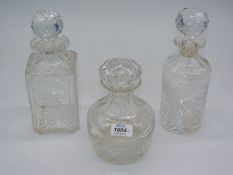 Three Royal Brierley decanters with matching etched Fuchsia design.