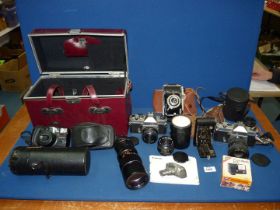 A quantity of photography items including Kodak Junior II camera, Samsung AF Zoom 1050 cased camera,