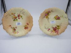 A pair of Royal Worcester blush ivory plates,