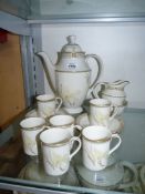 A Royal Doulton 'White Nile' fifteen piece coffee set including coffee pot (crack to lid & handle),