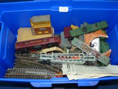 A quantity of Tri-Ang models including carriages, track, buildings etc.