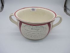 A 18th ** century humorous double handle "Marriage present" frog chamber pot with pink brush stroke