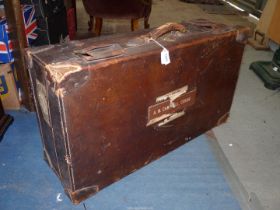 A large early 20th century quality Leather Suitcase with interior shelf and pouch and several old