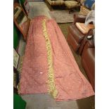 A pair of terracotta curtains with diamond pattern,