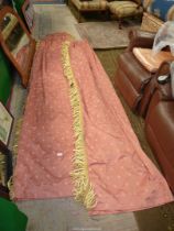 A pair of terracotta curtains with diamond pattern,