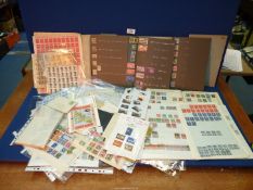 A box of stamps, albums and ephemera.