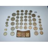 A quantity of coins including half crowns, shillings and sixpences (mainly between 1921 & 1947),