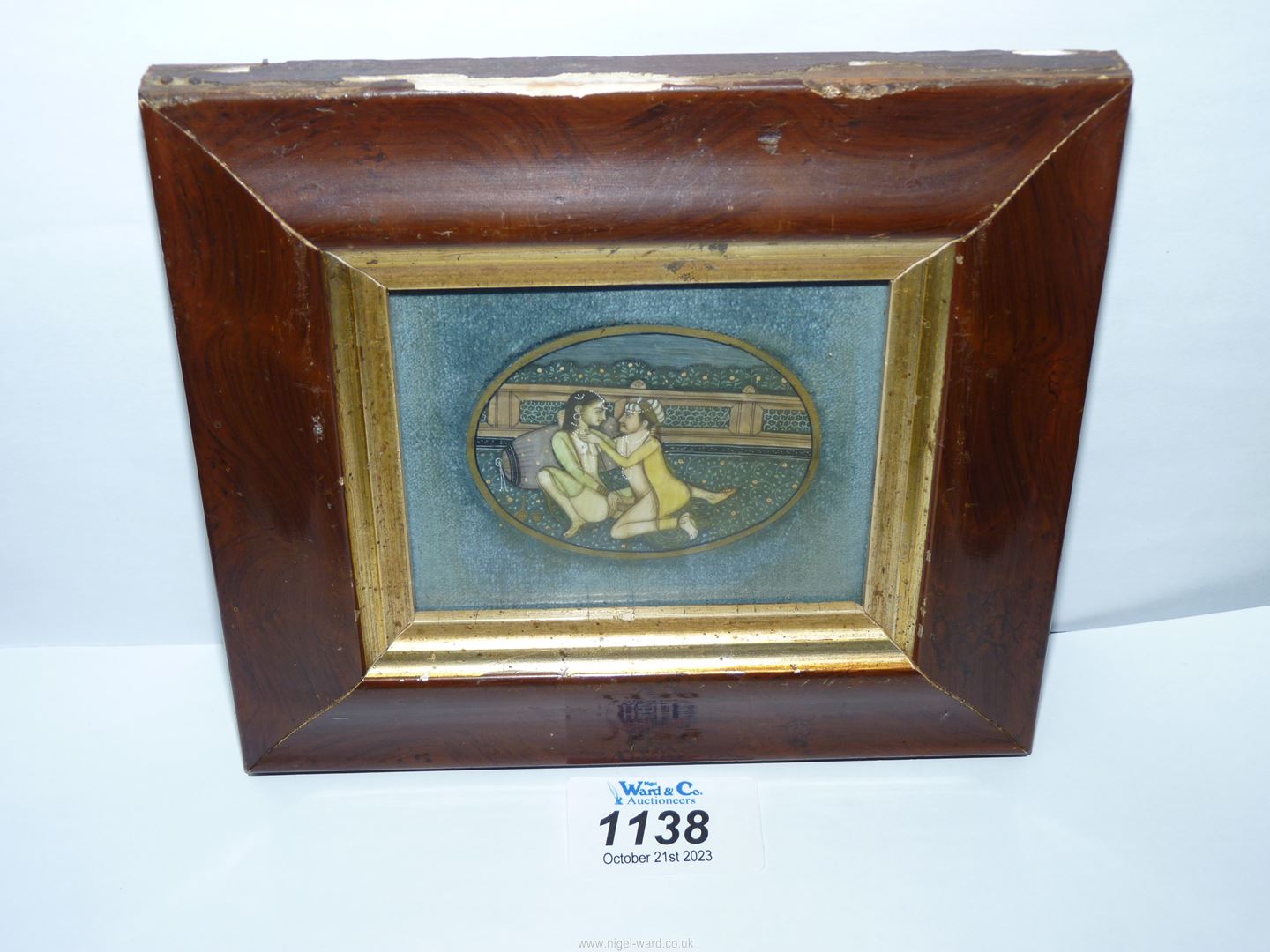 A framed Minature of erotic scene painted on ivory,