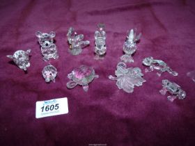 Ten Swarowski miniatures including cockerel, pig, elephant, etc.