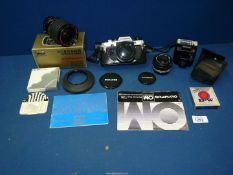 ***An Olympus OM10 35mm SLR Camera with a 50mm f/1.8 Zuiko Lens, a Sunagor 28-100mm f/3.5-5.