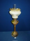 A vintage brass Oil lamp with glass shade, German made for S. Patterson*?, 28" tall.