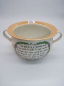 A 19th century humorous double handle "Marriage present" frog chamber pot with orange lustre