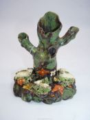 An Enoch Wood Staffordshire pearl four branch spill vase in the form of a tree trunk with a family