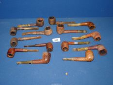 A hoard of 14 Briar pipes by various makers.