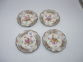 Four Schumann Dresden Pierced porcelain dishes, floral decoration, two damaged, circa 1930.