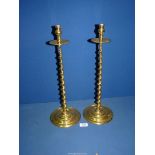 A heavy pair of brass altar Candlesticks with barley twist stem, 18" tall.