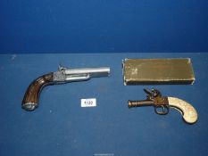 Two Replica pistols, single barrel flintlock pistol in Armas antique replica box,