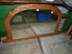 A large ornate carved Over-mantel Mirror, 41" wide x 28 1/2" tall.