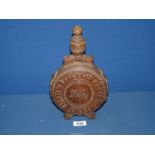 A 19th century Austrian heavily carved decorative moon shape circular wooden Flask with coat of