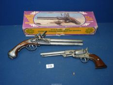 A boxed 18th Century Replica Flintlock English Pistol with two barrels and BKA 98 Revolver Replica.