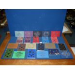 A quantity of 1972-1982 UK Proof coins in cases and sleeves.
