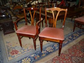 A set of six "Ducal" Pine framed contemporary dining chairs including two carver chairs,