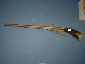 A replica Rifle for display purposes with boar head detail and wall mountings, 42" long.