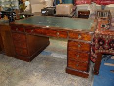 A fine old circa 1900 Mahogany partners' desk the kneehole having a frieze drawer and pedestals to
