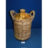 A large Stoneware bottle dated 1823, marked 'Mackenzie and Company, Wine and Spirit Merchants,