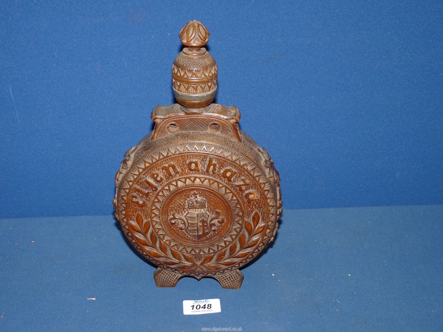 A 19th century Austrian heavily carved decorative moon shape circular wooden Flask with coat of - Image 2 of 15