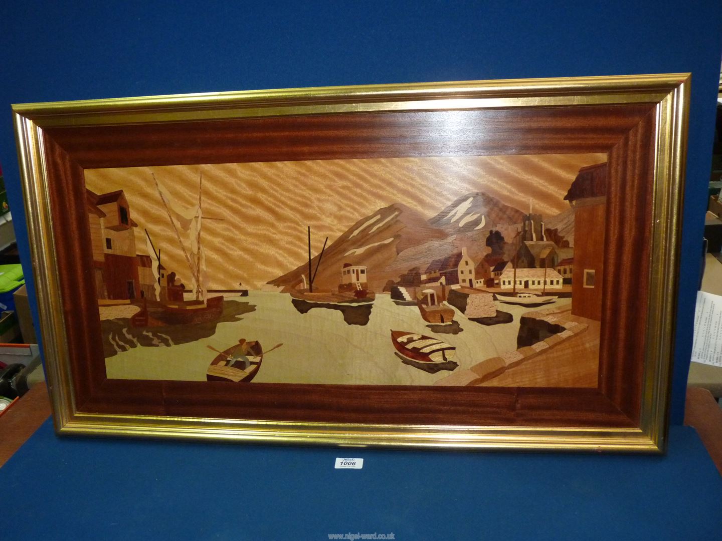 A large handcrafted Marquetry plaque of Harbour scene, frame size 35" x 19 1/2".