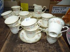 A Minton 'Jasmine tea service incl eleven cups and saucers, ten tea plates, milk jug,
