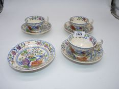 Three porcelain teacups and four saucers having Flying bird design.