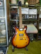 A Bowwood 6 string slim line double F-hole Jazz/Rock guitar and stand.