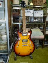 A Bowwood 6 string slim line double F-hole Jazz/Rock guitar and stand.