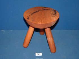 A three legged milking stool.