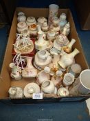 A large quantity of Royal Worcester Palissey trinket dishes, small tobacco jars with lids, vases,