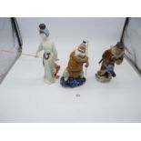 Two oriental figures, Monkey King, 10" high and Lady fishing and fisherman, * high.