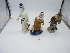 Two oriental figures, Monkey King, 10" high and Lady fishing and fisherman, * high.